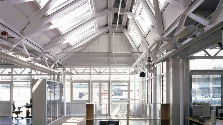 interior of office space with high white ceiling