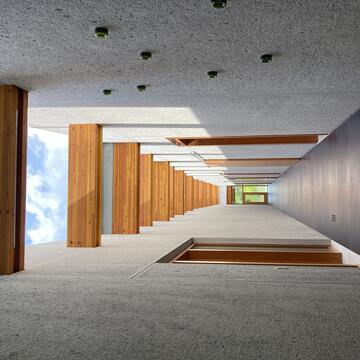 The gallery of the completed Thorne Residence showing the concrete walls in context. Image courtesy of Gerard Damiani.